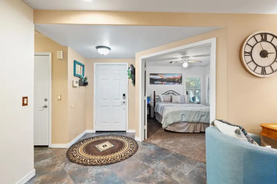 Front entry way into living area and 3rd bedroom Front entry way into living area and 3rd bedroom