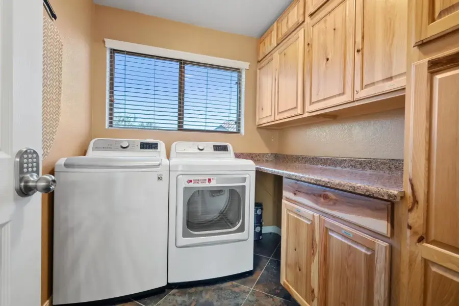 Separate laundry room with newer appliances Separate laundry room with newer appliances